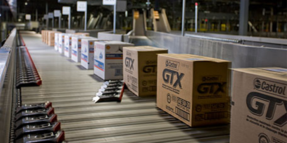 Castrol GTX boxes on a conveyor